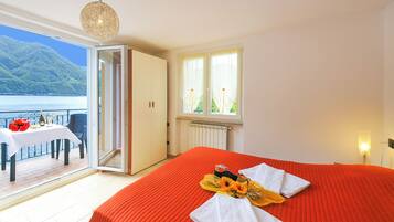 Family Villa, Multiple Bedrooms, 2 Bathrooms, Lakeside (Villa L'Approdo) | 4 bedrooms, iron/ironing board, WiFi, bed sheets