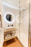 Apartment, 1 Bedroom | Bathroom | Shower, free toiletries, hair dryer, towels