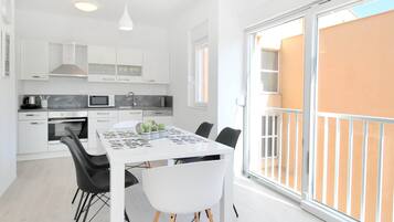 Apartment, 2 Bedrooms | Private kitchen | Full-size fridge, microwave, oven, stovetop