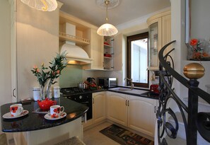 Family Villa, Multiple Bedrooms, Mountainside (Le Petit Palais Villa) | Private kitchen | Full-sized fridge, microwave, oven, stovetop - Le Petit Palais Villa (Menaggio)