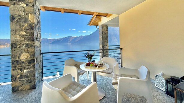 Căn hộ dành cho gia đình, 2 phòng ngủ, ban công, cạnh núi (Residence degli Oleandri 6A) | Khu ẩm thực ngoài trời