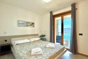 Family Apartment, Multiple Bedrooms, Mountainside (Residence degli Oleandri 6A) | 2 bedrooms, iron/ironing board, WiFi, bed sheets