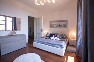 4 habitaciones, tabla de planchar con plancha, wifi y ropa de cama 