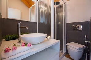 Shower, rainfall showerhead, hair dryer, towels