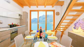 Family Apartment, Multiple Bedrooms, 2 Bathrooms, Mountainside (Riva Bellano Margherita 2) | Private kitchen | Microwave, oven, stovetop, dishwasher