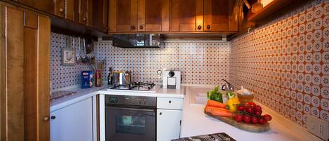 Family Villa, Multiple Bedrooms, Mountainside (Villa Il Castagno) | Private kitchen | Microwave, oven, stovetop, coffee/tea maker