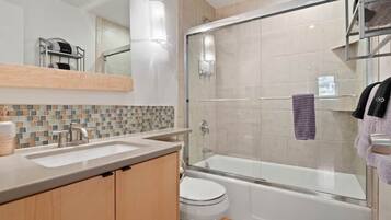 Bathtub, hair dryer, towels