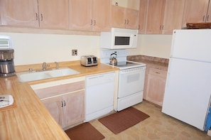 Condo, 2 Bedrooms | Private kitchen | Fridge, oven, coffee/tea maker, toaster