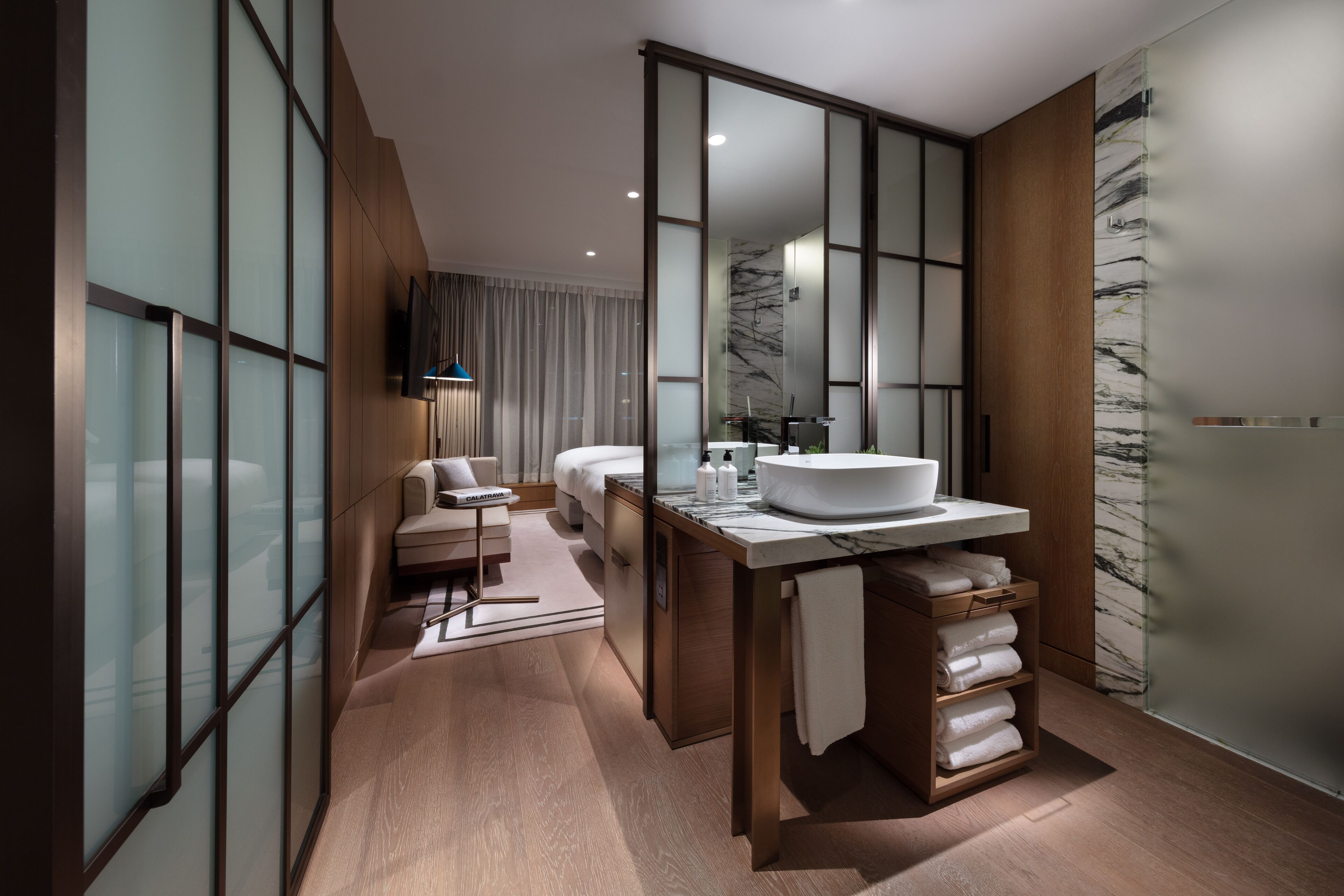 twin room | bathroom | designer toiletries, hair dryer, bathrobes, slippers