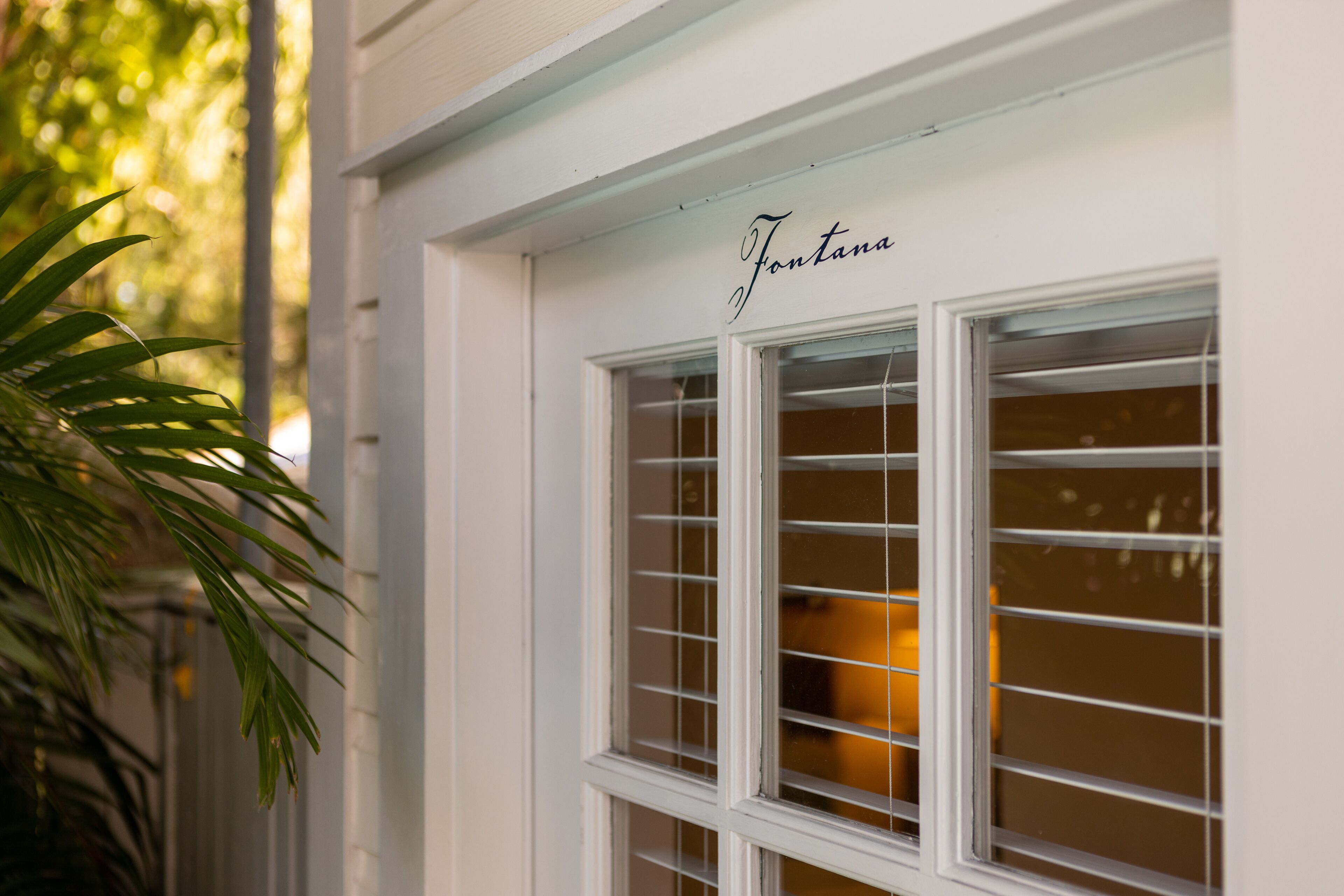 A window with the name "Fontana" on a building facade.