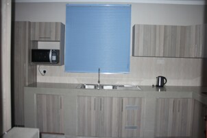 Fridge, microwave, oven, electric kettle
