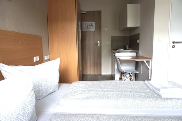 Traditional Apartment, 3 Twin Beds | 1 bedroom, premium bedding, desk, laptop workspace