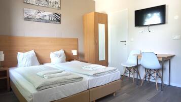 1 habitación, ropa de cama de alta calidad y escritorio