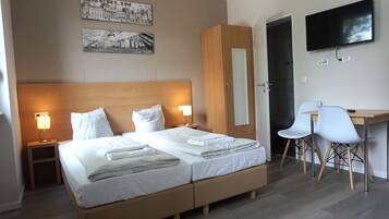 1 habitación, ropa de cama de alta calidad y escritorio