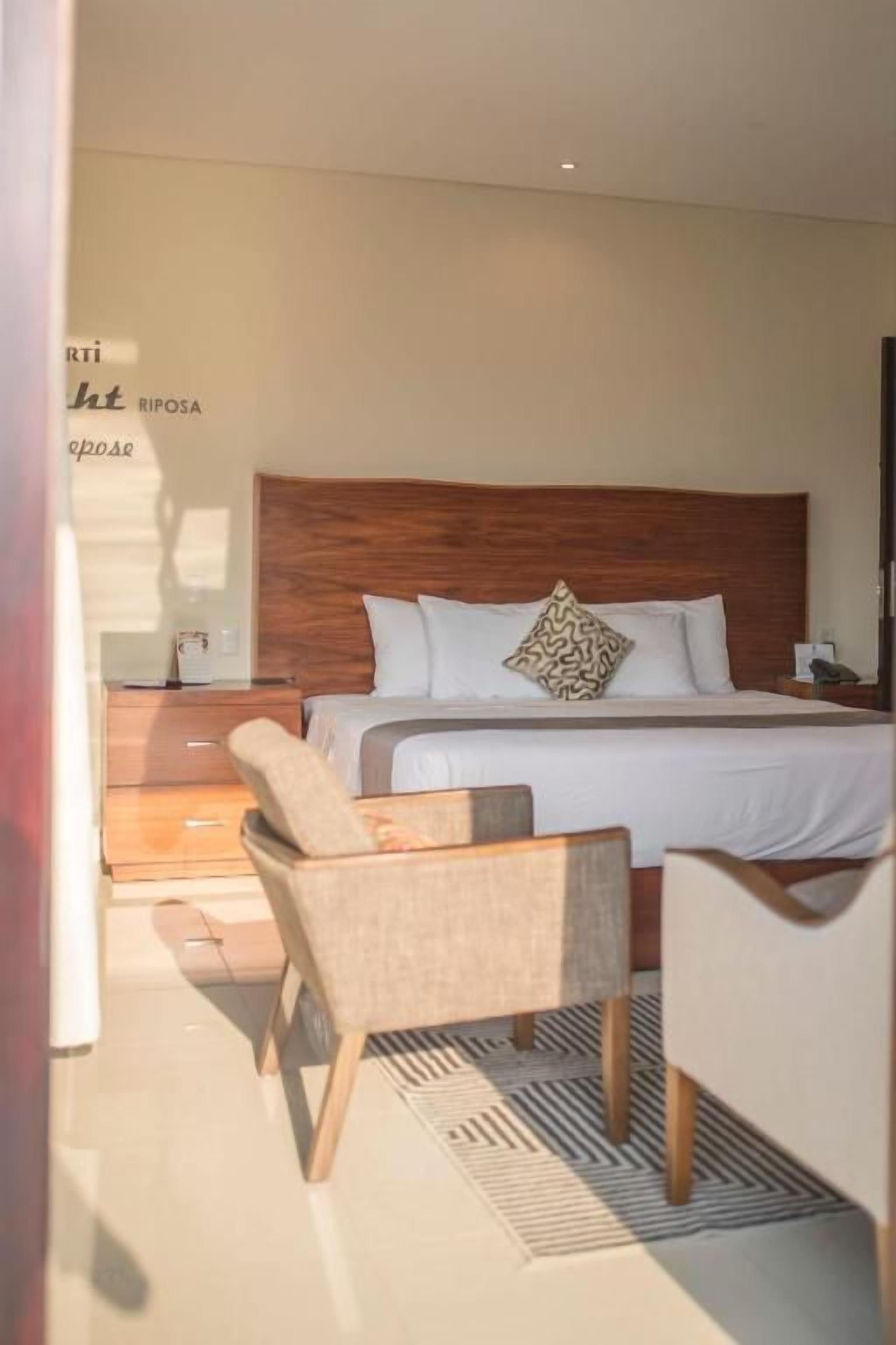 Deluxe Room | Memory foam beds, individually decorated, individually furnished, desk