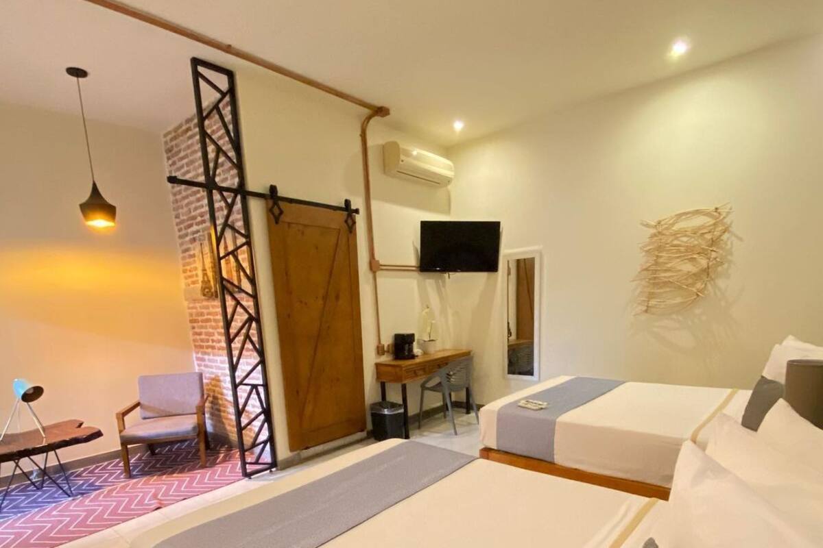 Memory-foam beds, desk, laptop workspace, blackout curtains