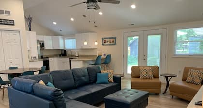 Gorgeous lake-access home with boat slip steps away from renowned Clark Lake!