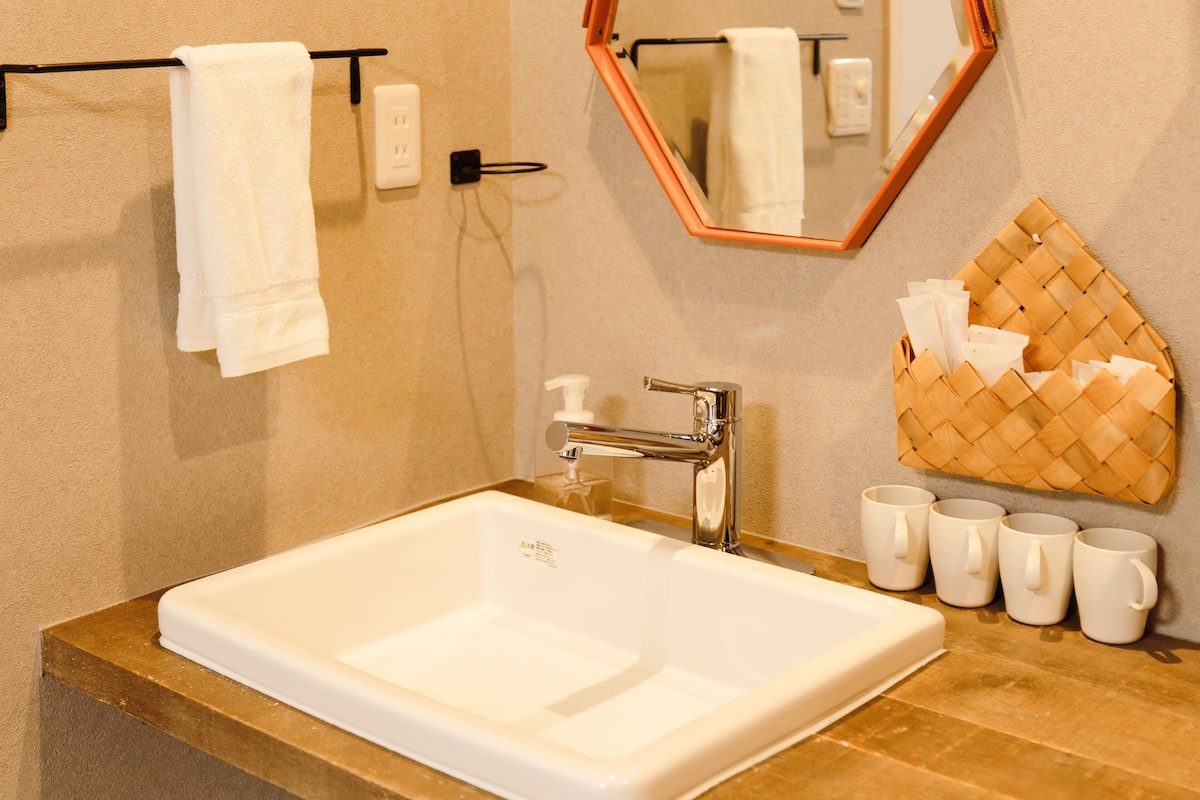 quadruple room, non smoking (1907) | bathroom | shower, free toiletries, hair dryer, slippers