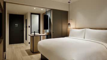 Chambre Standard, 1 très grand lit | Coffres-forts dans les chambres, Wi-Fi gratuit, draps fournis