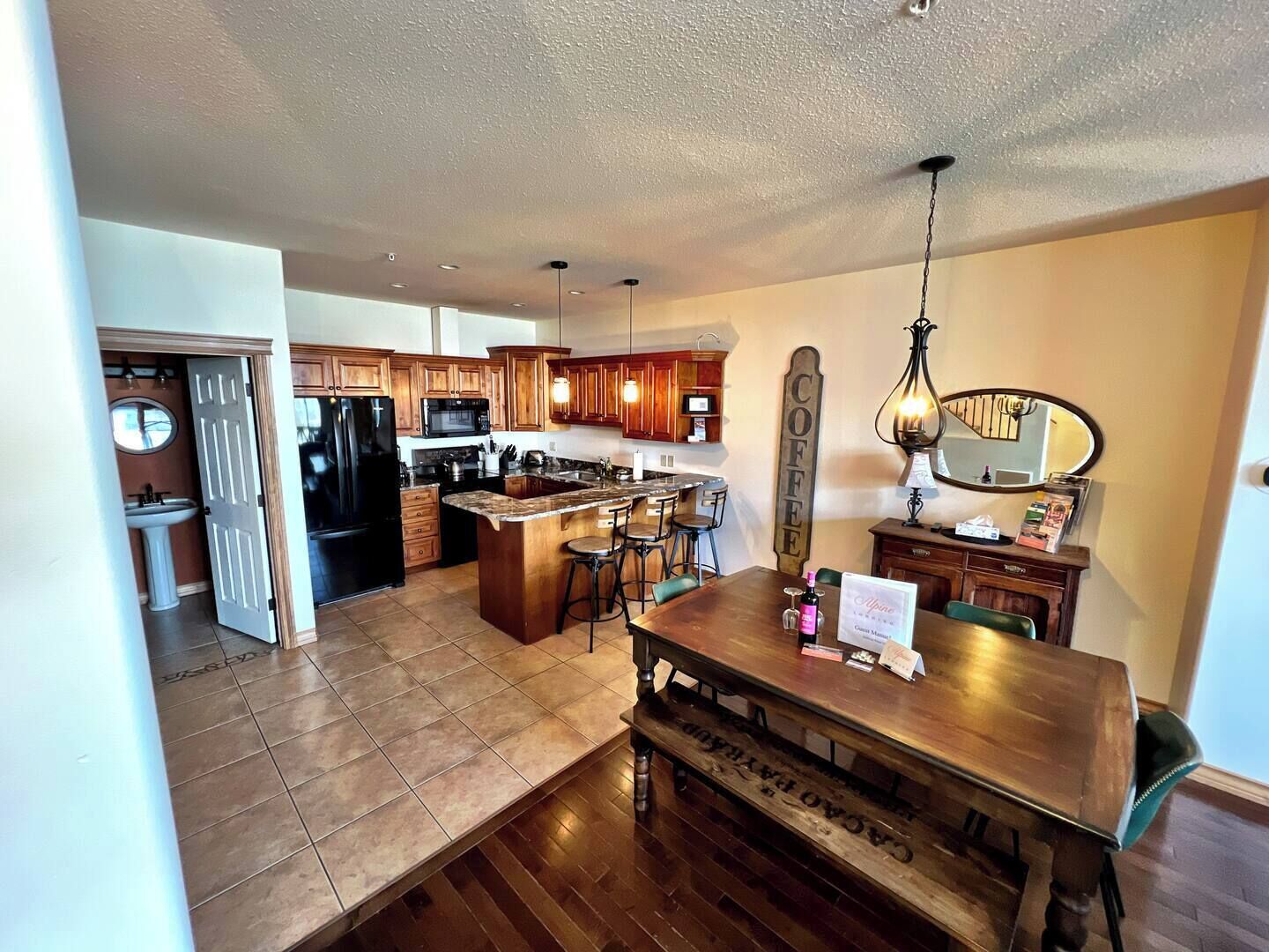 Spacious dining area. Open Plan Kitchen with seating at the bar.