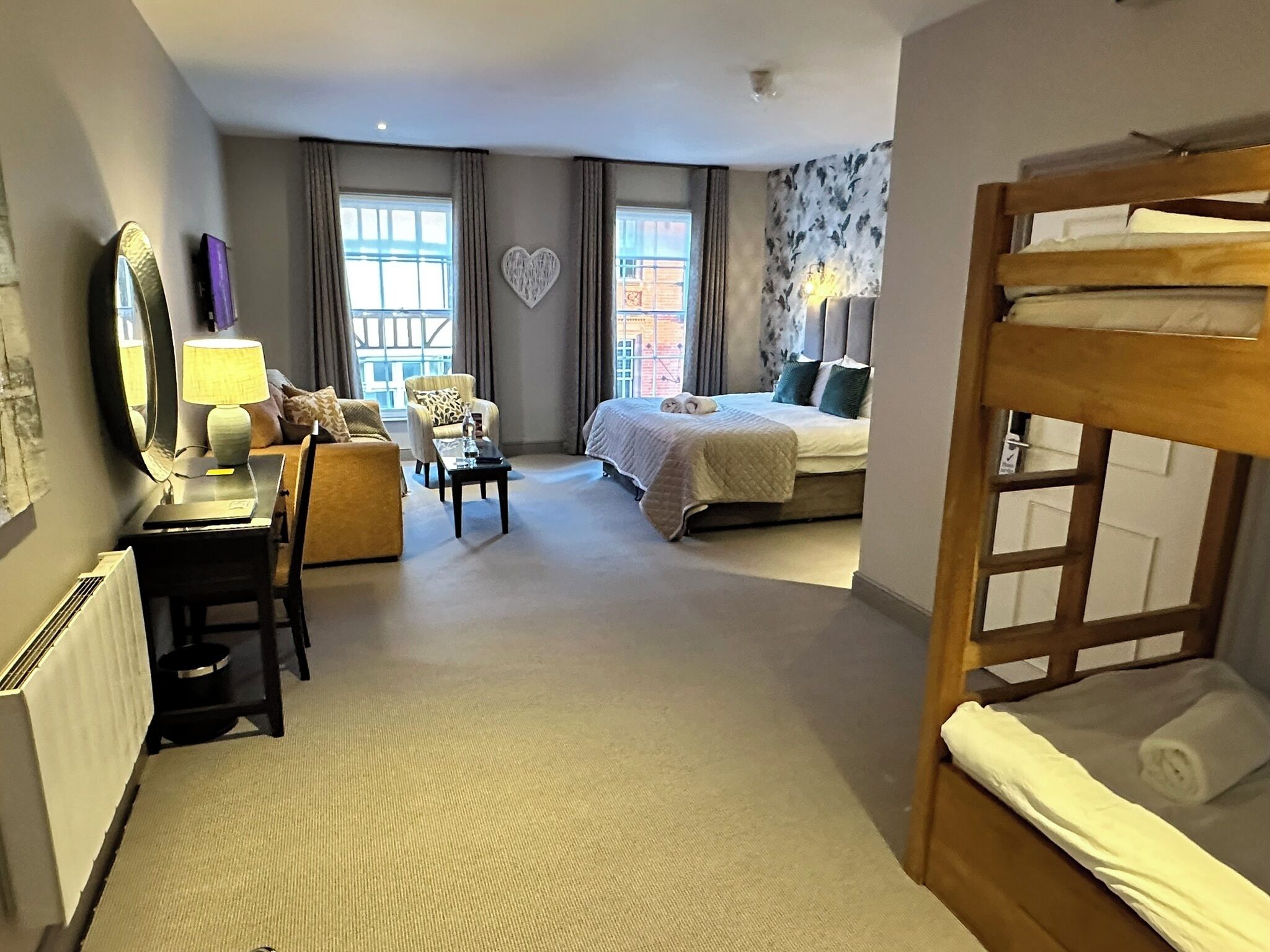 family room | 1 bedroom, in-room safe, desk, laptop workspace