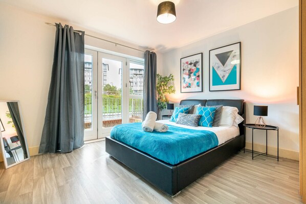 1 bedroom, desk, iron/ironing board, travel crib