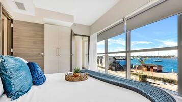 Condo, 2 Bedrooms, Balcony, Bay View | Iron/ironing board, free WiFi, bed sheets