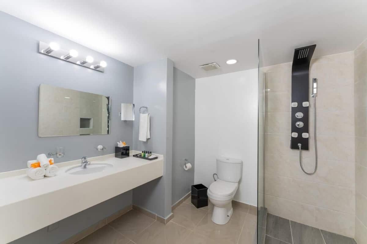 suite, 2 queen beds, non smoking | bathroom | shower, free toiletries, towels
