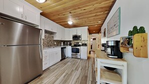 Condo, 2 Bedrooms | Private kitchen | Fridge, microwave, oven, stovetop