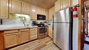 Condo, 2 Bedrooms | Private kitchen | Fridge, oven, coffee/tea maker, toaster