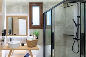 Shower, jetted bath, rainfall showerhead, hair dryer
