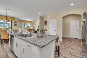 House (6 Bedrooms) | Private kitchen - Vibrant and Lush Home, Spacious Pool Area With CDC Standards #6st440 (Davenport)