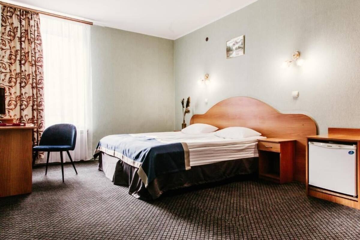 Standard Double or Twin Room | Minibar, in-room safe, desk, laptop workspace