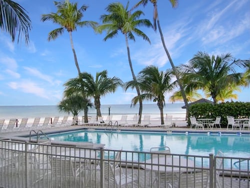 Top Floor Beachfront & Sunset Views! Renovated! WIFI, Smart TV's + Work Space!