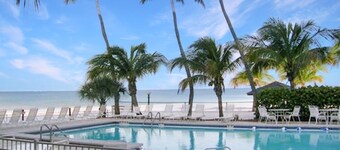 Top Floor Beachfront & Sunset Views! Renovated! WIFI, Smart TV's + Work Space!