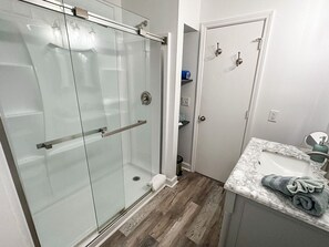 Shower, hair dryer, towels