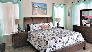 A bedroom with a bed, nightstands, a ceiling fan, and curtains. - Spacious Luxurious 6 Bedroom 5 Bath Villa Sleeps 12 Pool, Jacuzzi, near Disney (Kissimmee)