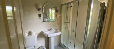 Shower, free toiletries, towels, soap