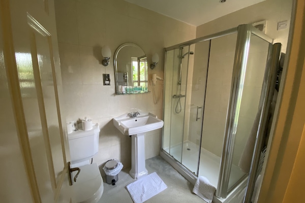 Shower, free toiletries, towels, soap
