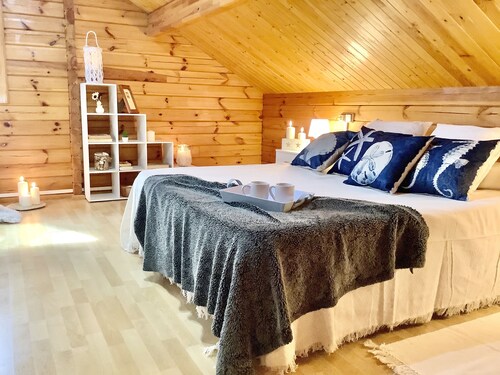 Beautiful wooden villa in a charming place surrounded by nature. 