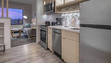 Suite, 1 Bedroom | Private kitchen | Microwave, oven, stovetop, dishwasher