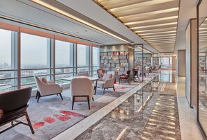 Suite Club, 1 très grand lit | Salon Exécutif