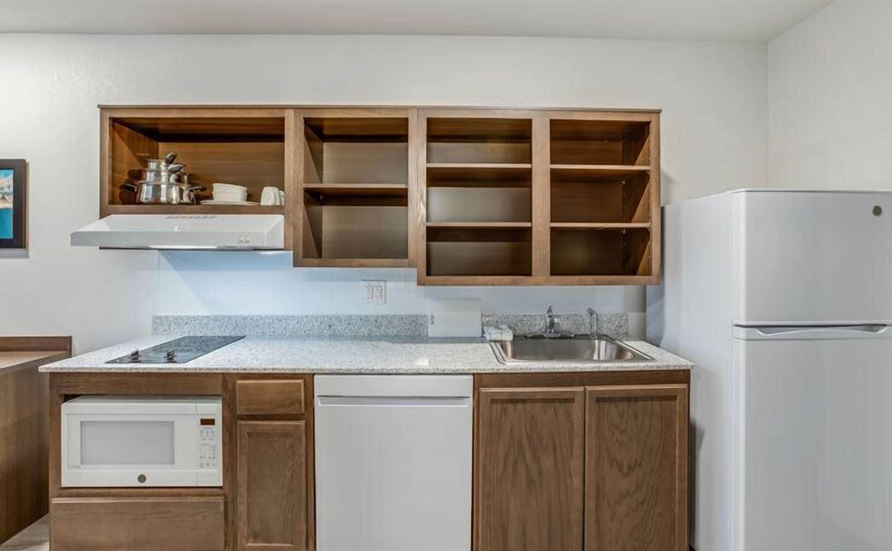 full-sized fridge, microwave, stovetop