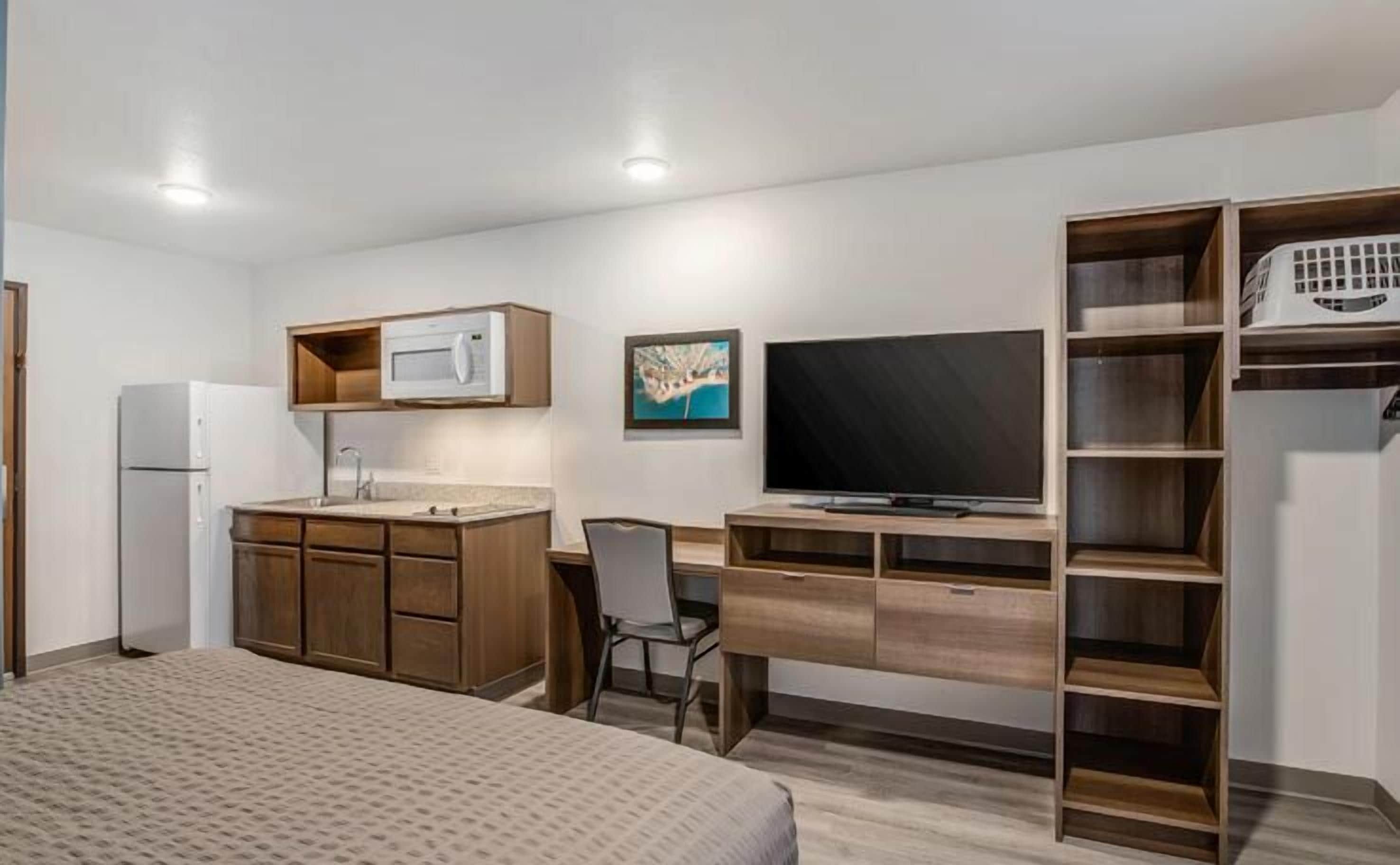 full-sized fridge, microwave, stovetop