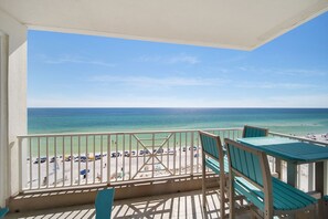 A balcony with a view of a beach and ocean. - 2-Story Penthouse at The Inn at Crystal Beach! Beachfront Designer 5BR/4BA. Sleeps 14 (Destin)