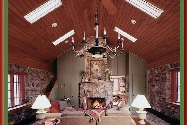 Living Room w 30 ft high vaulted ceiling