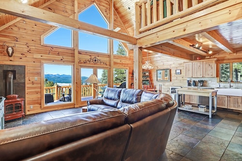 Incredible Views! Stunning log home w/ wrap around deck and covered porch 