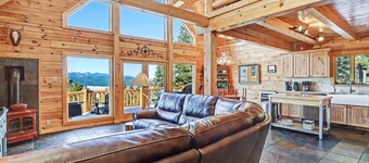 Incredible Views! Stunning log home w/ wrap around deck and covered porch 