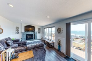 TV, fireplace, books