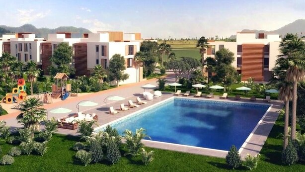 A modern hotel with a swimming pool, lounge chairs, and a landscaped garden. - Residence Tamourrit Taghazout Bay 4747 (Taghazout)